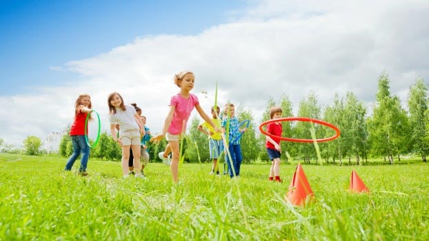 Toddlers Playing Outside At Daycare